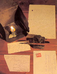 A lamp and a writing case made by Father de Foucauld.